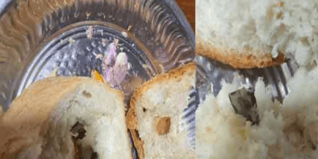 வாங்கிய பாணில் கண்ணாடி துண்டு