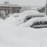 மூழ்கியது அமெரிக்கா பனி மழையில்